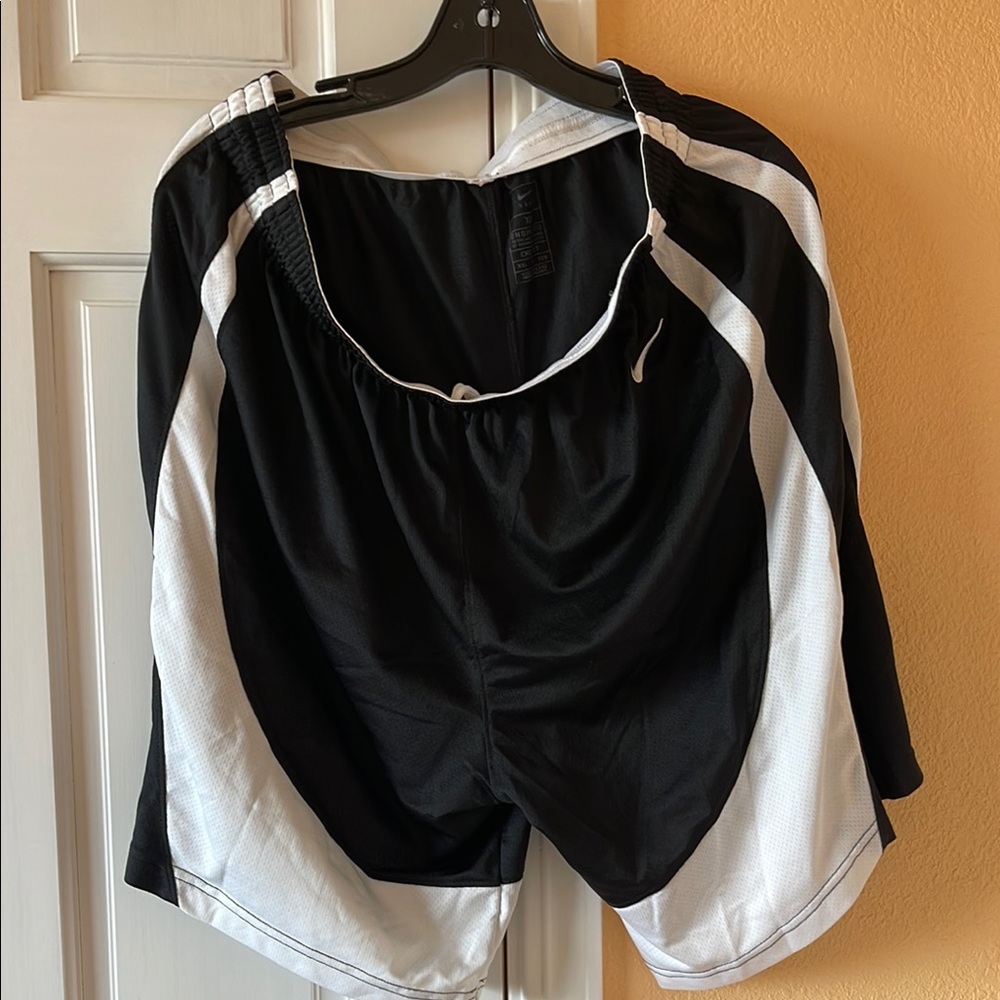 4 shorts $15 total, one Jordan(XL), one adidas(XL), one Nike,(XL),one Nike(XXL)